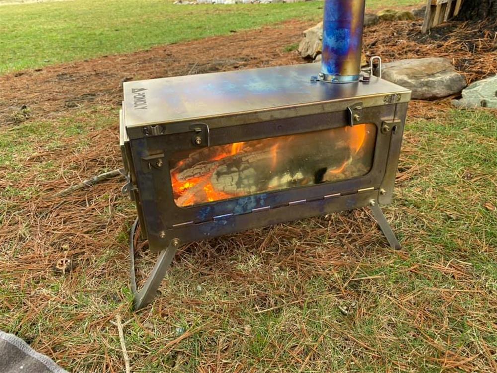 Burning wood stove in outside